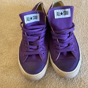 Dark purple converse.